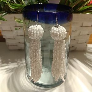 White beaded tassle statement earrings